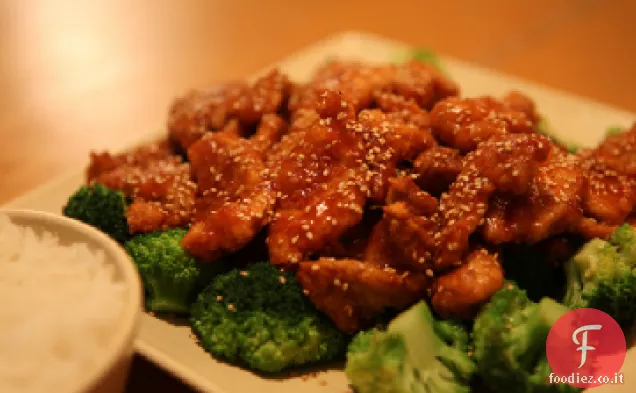 Pollo al sesamo con broccoli e piselli
