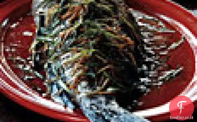 Intero Black Bass con zenzero e scalogno