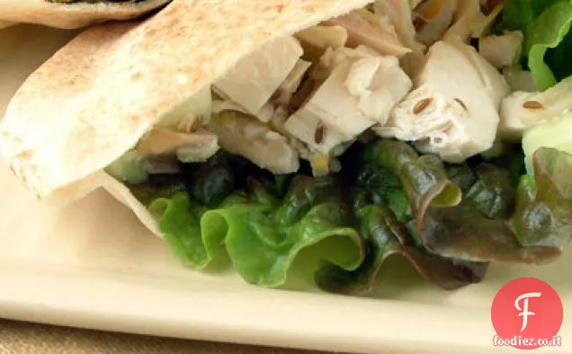 Pitas di pollo arrosto con condimento al cumino e limone