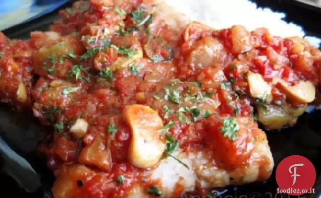 Pesce in salsa di melanzane alla bolognese