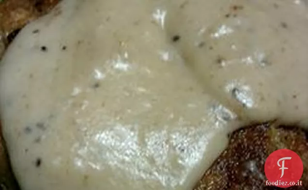 Bistecche fritte di campagna con sugo di cipolla dolce