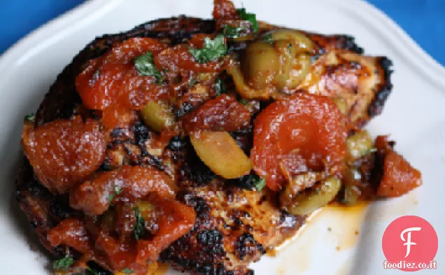 Tagine di pollo marocchino con pomodori secchi e carciofi