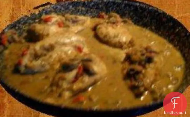Pollo con salsa al curry di funghi