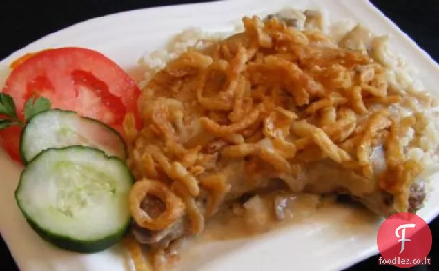 Braciole di maiale soffocato con sugo e riso