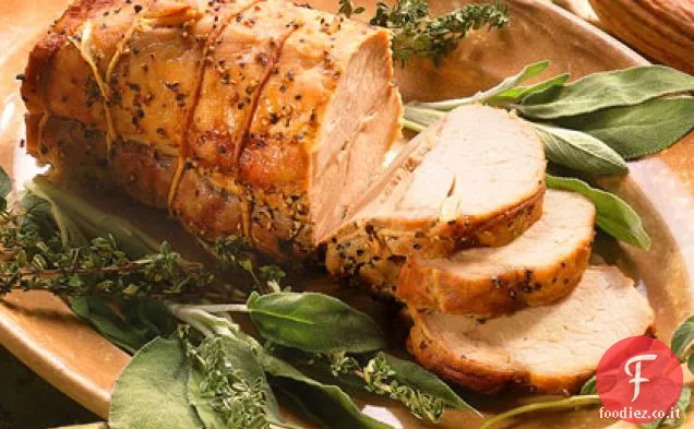 Arrosto di lombo di maiale tempestato di aglio