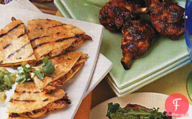 Drummettes di pollo alla griglia con salsa barbecue all'anco-ciliegia