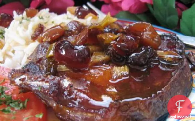 Costolette di maiale Saucy con mirtilli rossi per la pentola di coccio!