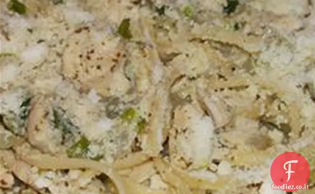 Pollo e cipolle su linguine