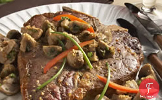 Bistecca all'osso con funghi spolverati di parmigiano