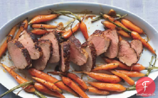 Filetto di maiale strofinato con spezie con carote arrosto