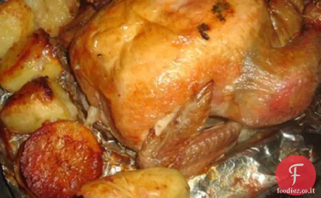 Cipolla ripiena di pollo arrosto con patate