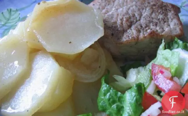 Carne di maiale e patate cuocere