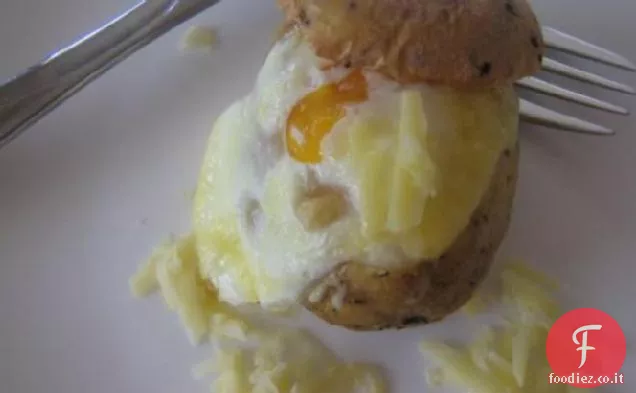 Uova in patate al forno
