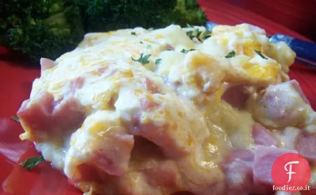 Prosciutto cotto e formaggio in una crosta di purè di patate