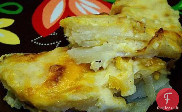 Patate al formaggio con cipolle