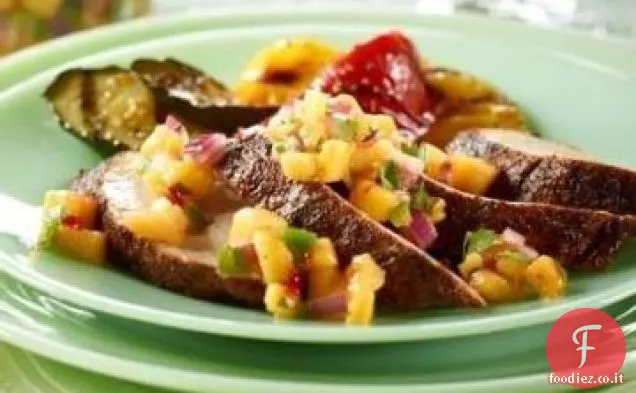 Maiale con pesca e salsa di fagioli neri