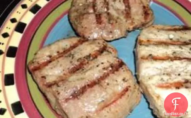 Braciole di maiale al limone alle erbe grigliate