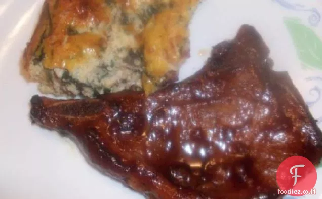 Braciole di maiale glassate di mela e uva