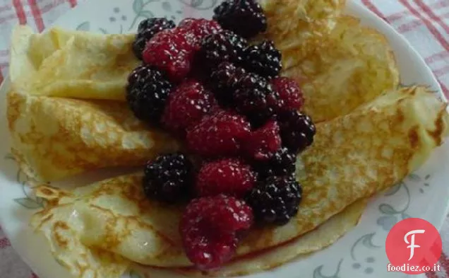 Frittelle svedesi con bacche-Cardamomo Topping