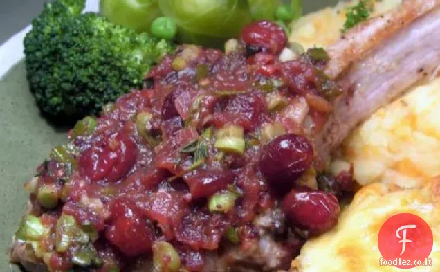 Braciole di maiale con salsa di mirtilli e timo
