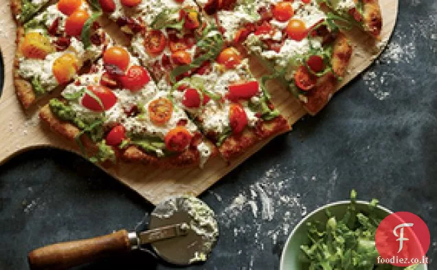 Verdure amare con formaggio di capra, pinoli e pere