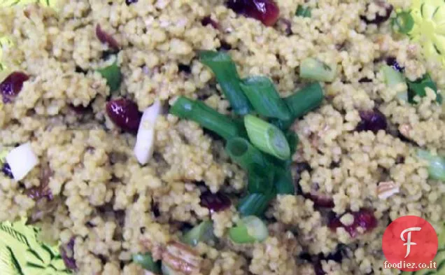 Couscous al curry con mirtilli secchi