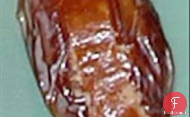 Linguiça-Datteri Medjool ripieni avvolti con pancetta