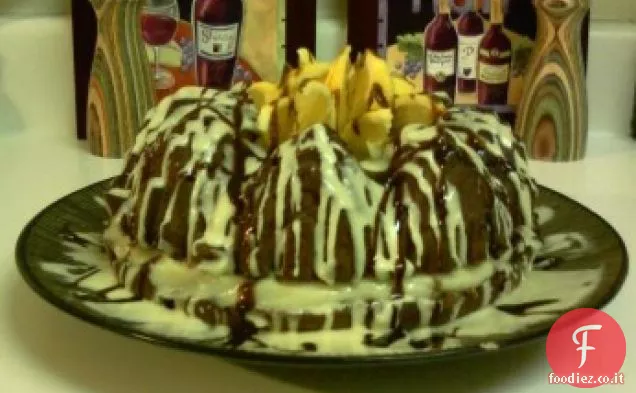 Torta alla crema al cioccolato con glassa all'arancia al burro