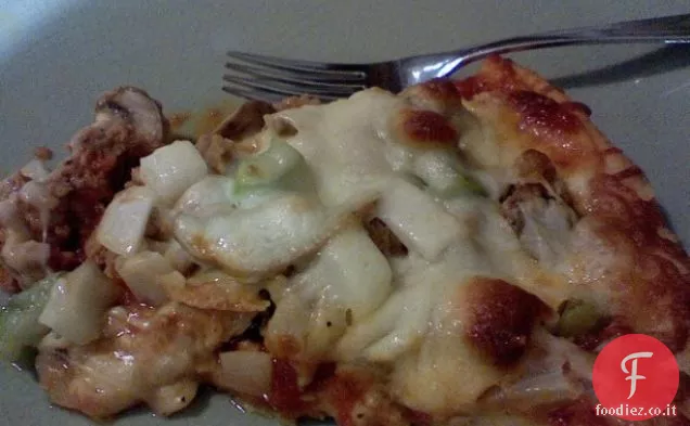 Pizza italiana con salsiccia di tacchino