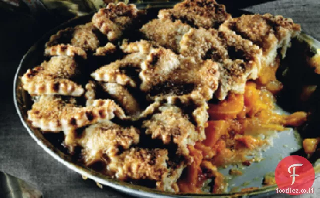 Torta di pesca e cardamomo in crosta superiore