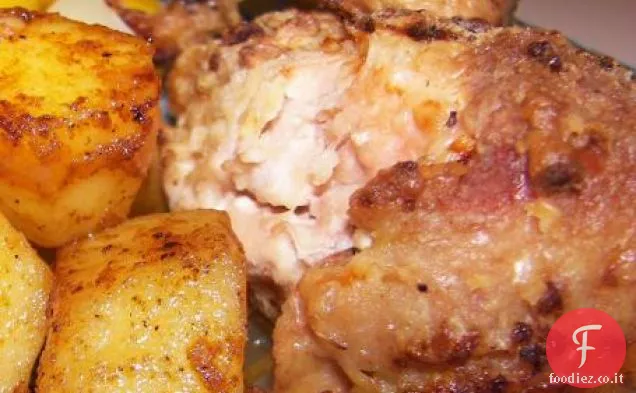 Pollo al forno con cipolle, aglio e rosmarino