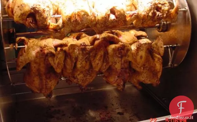 Galline della Cornovaglia marinate al girarrosto