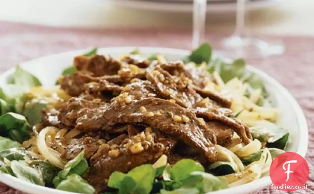 Manzo caldo e insalata di crescione appassito