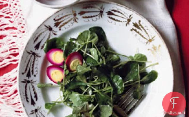 Insalata di crescione con uova di quaglia in salamoia
