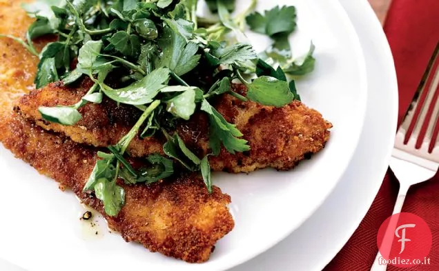 Cotolette di vitello fritte con insalata di erbe