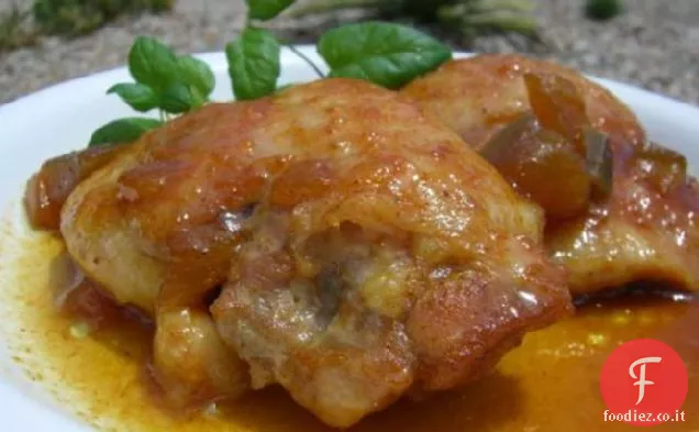 Cosce di pollo in una marinata di curry di mango
