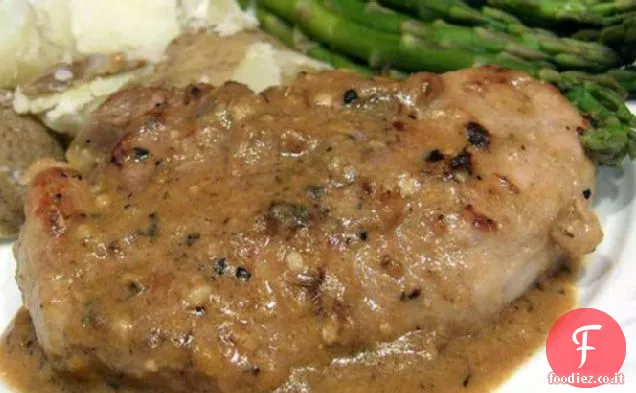 Cotolette di lombo di maiale con salsa al limone e timo