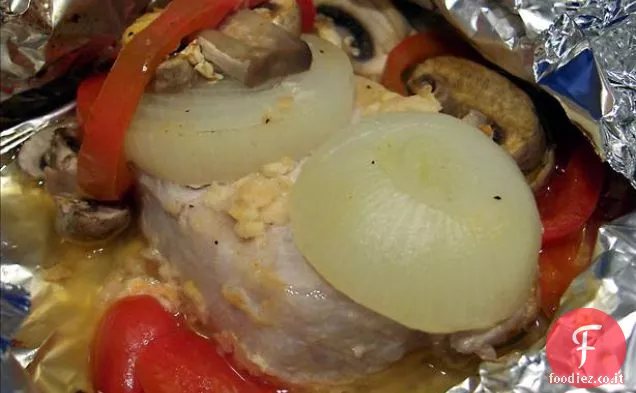 Umido braciole di maiale al forno impanate in sugo di funghi