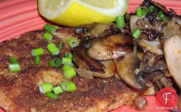 Capesante di maiale impanata con salsa di funghi