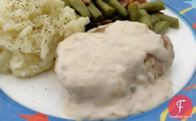 Braciole di maiale soffocato nel sugo di funghi