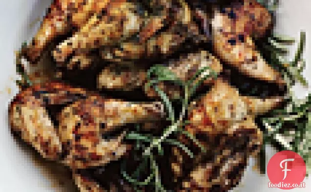 Poussins alle erbe alla griglia