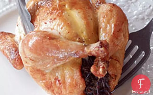 Galline della Cornovaglia ripiene di riso selvatico e porri