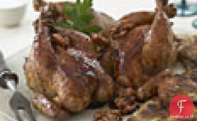 Poussins arrostiti con salsa di melograno e Rösti di patate