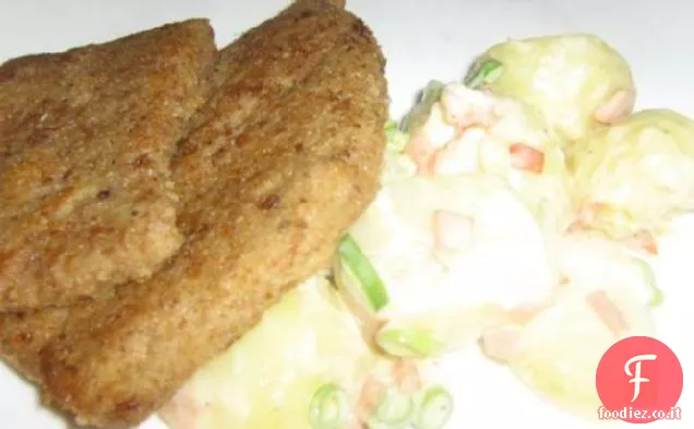 Schnitzel Weiner con una corretta insalata di patate