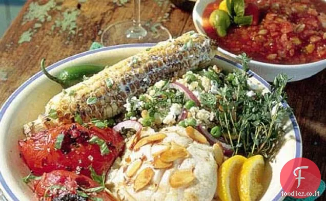 Snapper alla griglia con salsa di mandorle e arancia