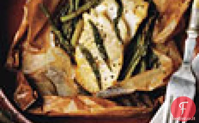 Filetti di Pesce in Pergamena con Asparagi e Arancia