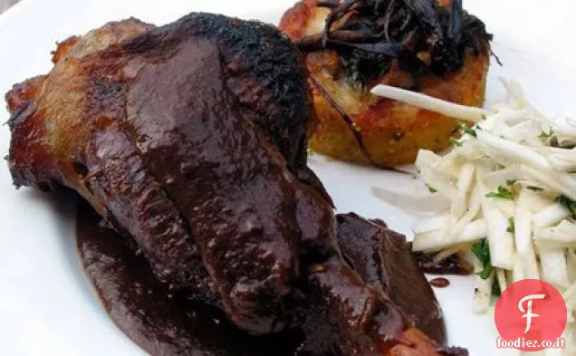 Stinchi di capra brasati con riduzione di prugne, scalogno e brandy