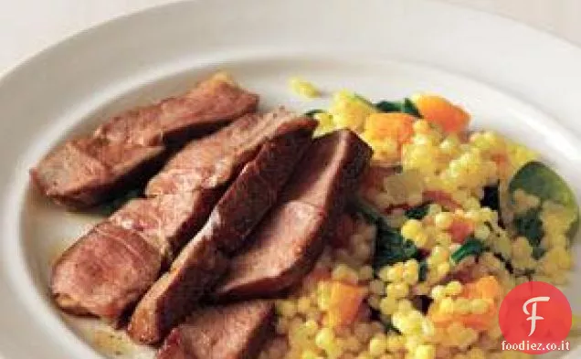 Agnello scottato con cuscus israeliano dorato