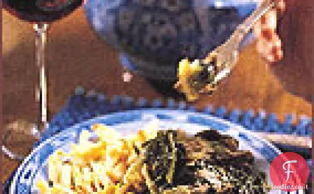 Stufato di agnello piccante con lattuga e scalogno