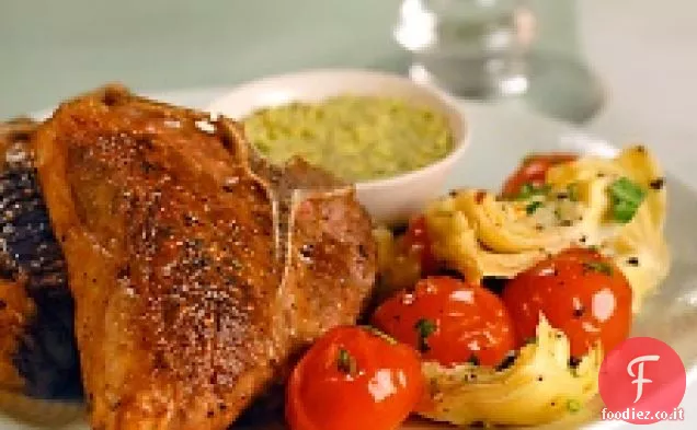 Costolette di agnello con salsa di pistacchi e verdure saltate